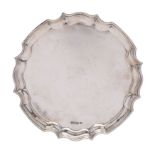 A George V silver circular waiter, makers James Deakin & Sons,