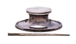 A silver capstan inkwell (probably Birmingham 1923,