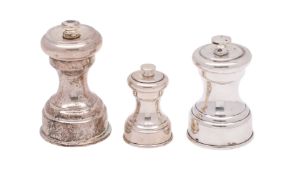A George V silver churn-shaped pepper mill, makers Stokes & Ireland Ltd.