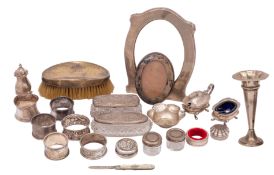 A mixed collection of silver items to include;- an Elizabeth II three-piece cruet set,