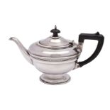 A George V silver circular teapot, maker T.S.