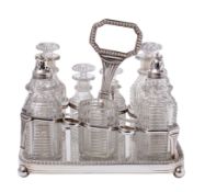 A 19th Century old Sheffield plated seven bottle cruet of rectangular shape with a reeded edge and