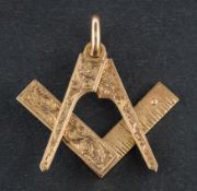 A 9ct gold folding set square and dividers fob, with foliate engraving, length (exl jump ring) ca.