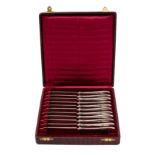 A set of eleven (of twelve) Swiss silver 800 dessert knives with reeded and oval decorated handles,