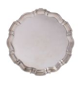 A George V silver circular salver, makers Barker Brothers Silver Ltd,