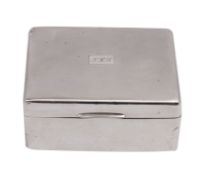 A George V silver cigarette casket, makers William Neale & Son Ltd.