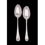 Two Hanoverian dessert spoons, one Britannia Standard with rat's tail decorated bowl,