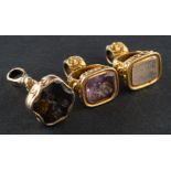 Three gemset fobs, including an amethyst fob, a smokey quartz fob and an agate fob,