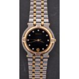 Gucci, a ladies quartz wristwatch the black dial signed Gucci, with inset paste stones at the hours,