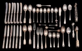 A group of silver cutlery including a George V christening spoon and fork,