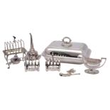 An assortment of plated items to include a seven bar toast rack on a stand with spirit lamp,