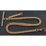 A graduated, curb-link Albert watch chain, with a dog clip and T-bar, the dog clip,