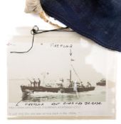 The ship's pennant from the Kent and Essex Thames Fireboat 'Fireflair': white text on blue ground,