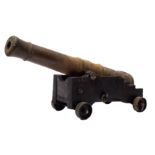 A George V cast iron desktop cannon: the 15 inch four stage barrel with crown and 'GR' cipher,