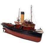 A scale model of the tug 'Tanga': fitted black banded cream stack , aerial masts,