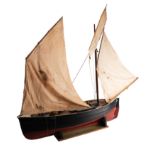 A scale model of a Penzance Lugger 'PZ207': set full sail over simulated plank deck, with capstan,