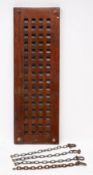 A rectangular teak deck grate: with brass suspension loops and a bag of chain, 37.