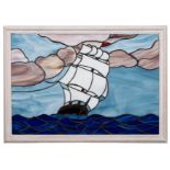 A stained glass panel of a sailing ship, maker Mark Hawler, Teignmouth: set full sail on a swell,