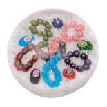 A Clichy garland millefiori paperweight with central pink and white 'Clichy rose' surrounded by a