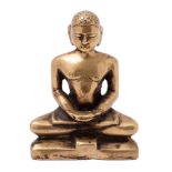 An Indian Jain bronze figure of Suparsvanatha in lotus position with palms upwards,