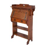 An oak upright bureau in Arts and Crafts style,