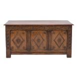 An oak coffer in Jacobean style,