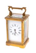 A French Victorian carriage clock having an eight-day duration timepiece movement with a silvered