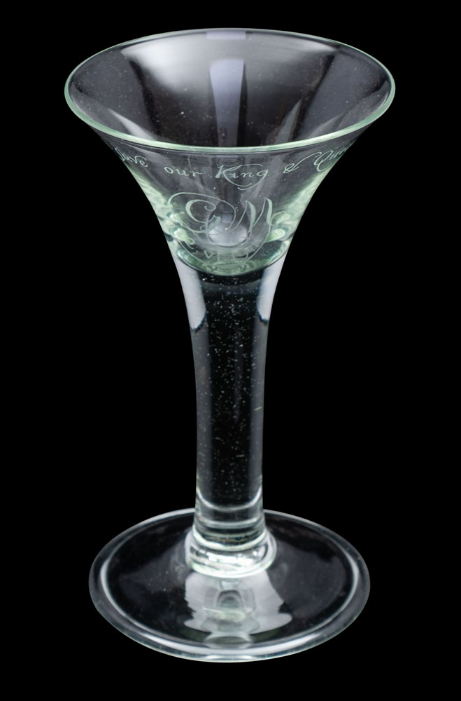 A Royal commemorative glass of trumpet shaped form, straight stem and fold over foot,