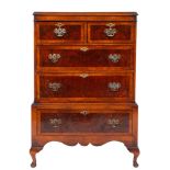 A walnut and crossbanded chest on stand in the early 18th Century manner,