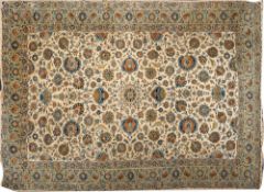 A Nain carpet, the ivory field with a small central medallion and all over Shah Abbas designs,