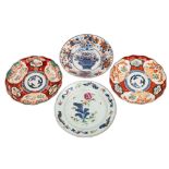 Four Oriental porcelain plates, comprising a Chinese famille rose example,