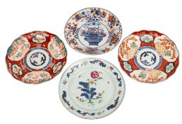 Four Oriental porcelain plates, comprising a Chinese famille rose example,