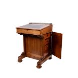 A Victorian walnut Davenport, by Thomas Filmer, London,