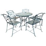 A suite of painted iron garden furniture, modern; comprising a circular table,