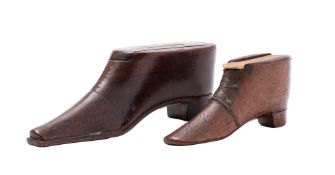 Two George III treen snuff shoes, circa 1780; the larger example in walnut,