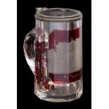 A ruby flashed spa tankard and cover with pewter mounts engraved with a named topographical view