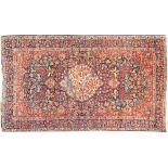 A Kirman carpet,