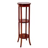 An Edwardian mahogany and inlaid circular three tier jardiniere stand,