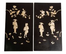 A pair of Japanese bone inlaid black lacquer relief panels depicting a fisherman and a peasant,