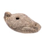 A Roman pottery oil lamp, probably 2nd/3rd century A,D.