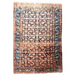 A Khamseh rug, the shaded field with an all over geometric design,