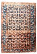 A Khamseh rug, the shaded field with an all over geometric design,