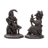 A pair of Victorian iron door porters relief cast as Mr Punch and Judy,