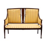 An Edwardian mahogany and marquetry settee,