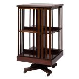 An Edwardian mahogany and crossbanded revolving bookcase,