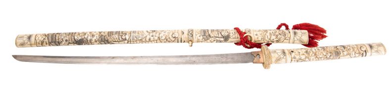 A Japanese bone-mounted wakizashi the grip and scabbard with carved and stained figural decoration,