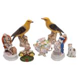 A group of Continental porcelain, including a pair of yellow songbirds,