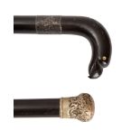 An Indian ebony and bone inset walking stick, early 20th century; the handle carved as bird's head,