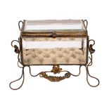 A glass and gilt metal mounted table top display casket, early 20th century; of rectangular form,