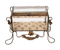A glass and gilt metal mounted table top display casket, early 20th century; of rectangular form,